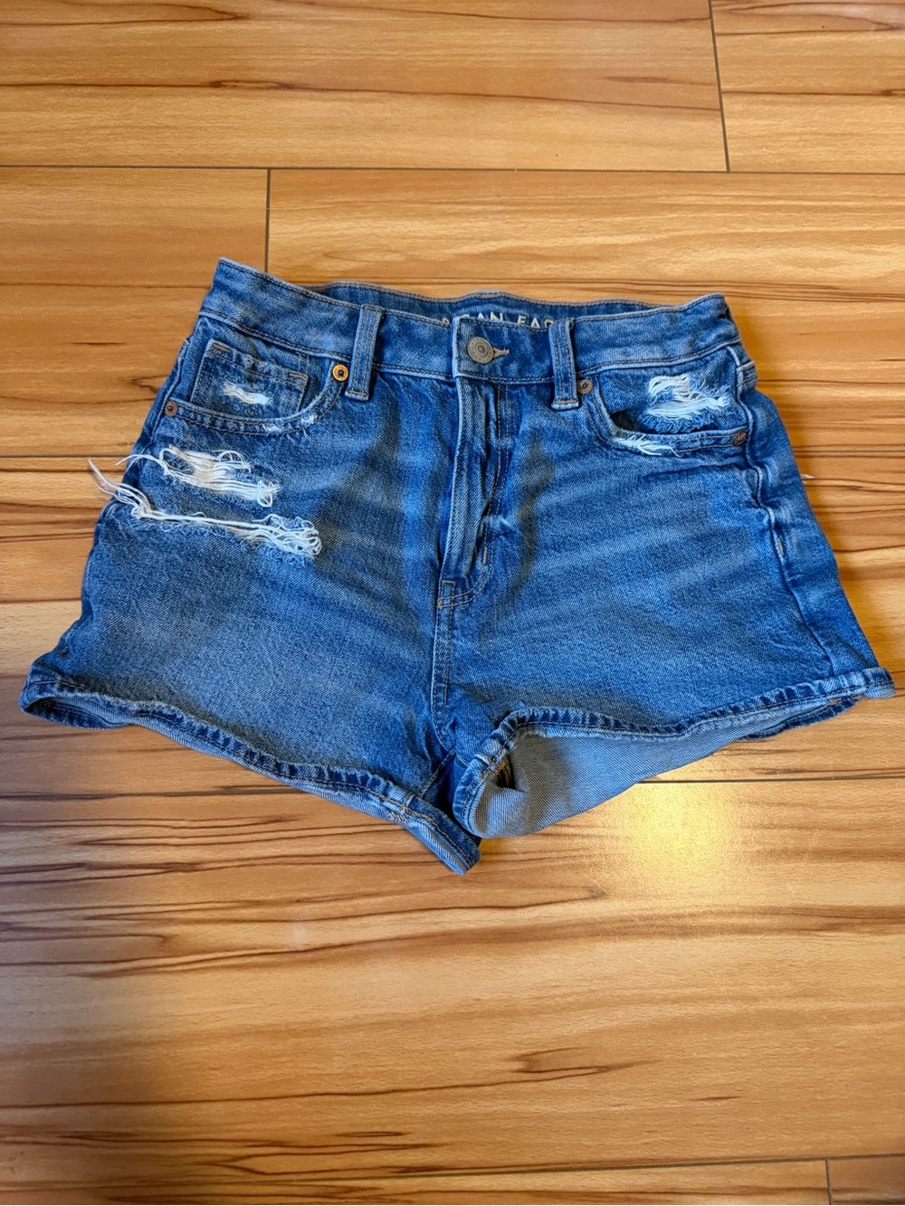 High-Rise Distressed Denim Shorts